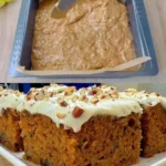 Classic carrot cake with cream cheese frosting on a decorative plate