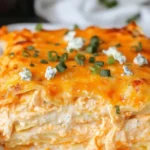 Cheesy Buffalo Ranch Chicken Lasagna with layers of chicken and cheese